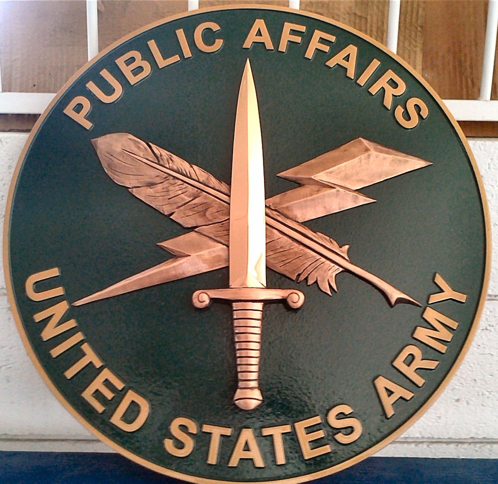 Cast bronze Military seal with 3D sculpted emblem design.